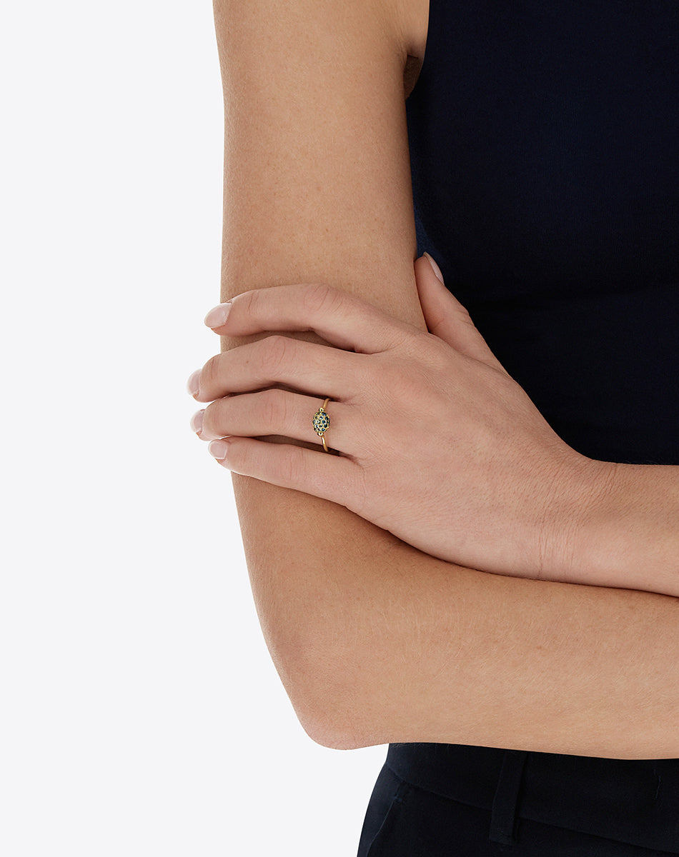 Double-sided “Reverse Baby” gold ring with blue diamonds, Swiss light blue topaz, green sapphires and London blue topaz