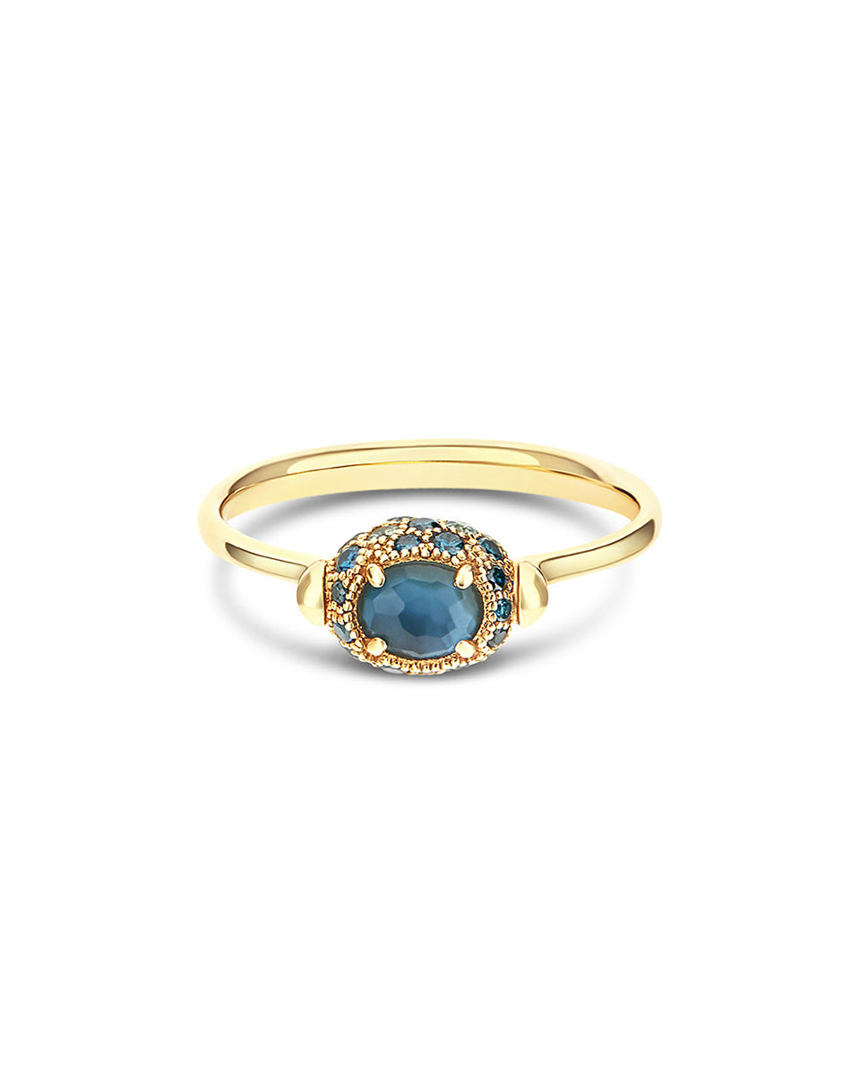Double-sided “Reverse Baby” gold ring with blue diamonds, Swiss light blue topaz, green sapphires and London blue topaz