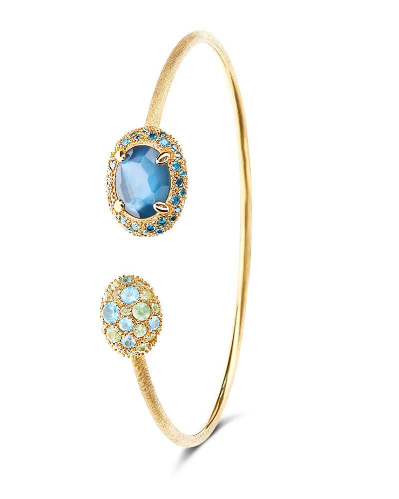 Reverse bracelet, bangle, in gold, blue diamonds, Swiss blue topaz, London blue topaz, mother-of-pearl and green sapphire